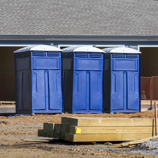 what is the cost difference between standard and deluxe portable toilet rentals in Charlestown RI